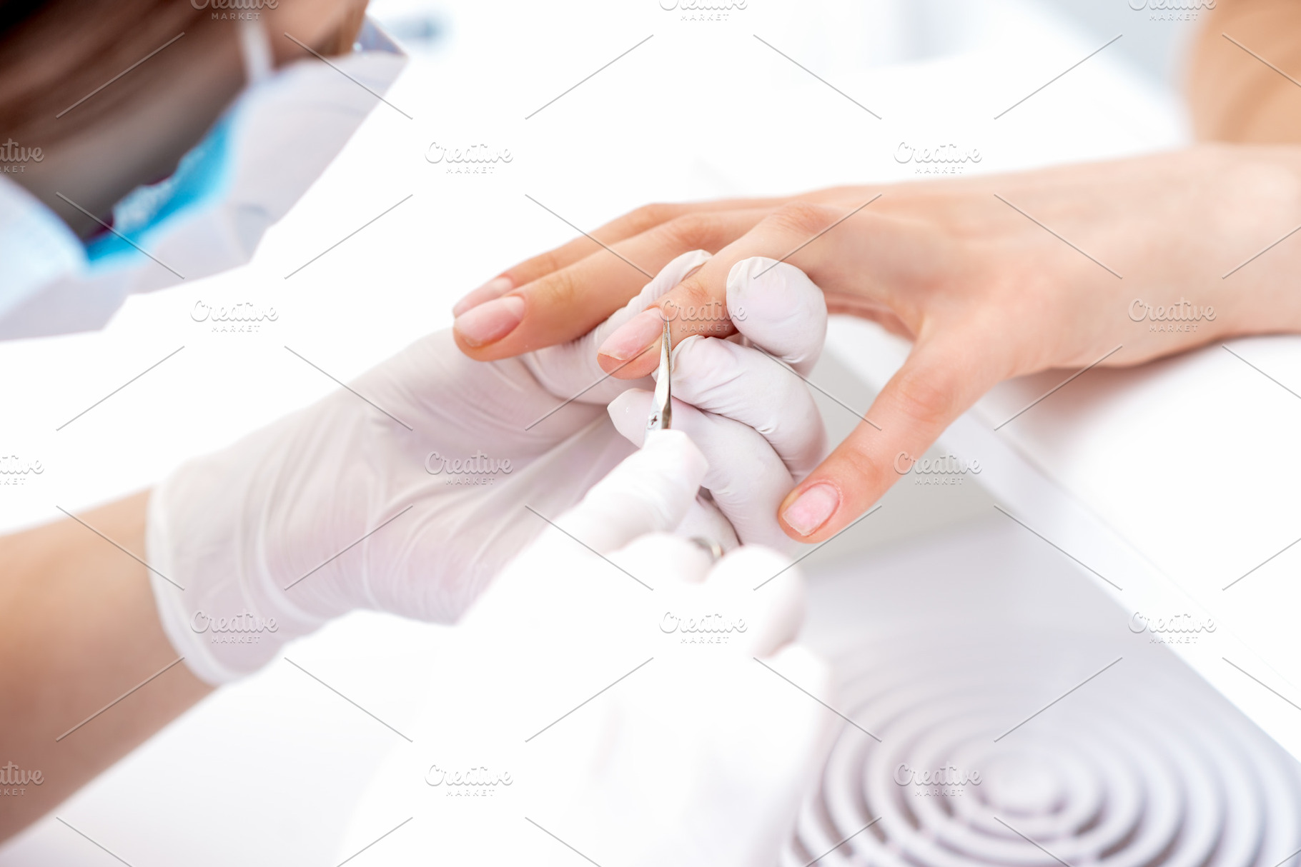 Close up of manicurist using manicur stock photo containing manicure and, a Beauty & Fashion Photo by okskukuruza