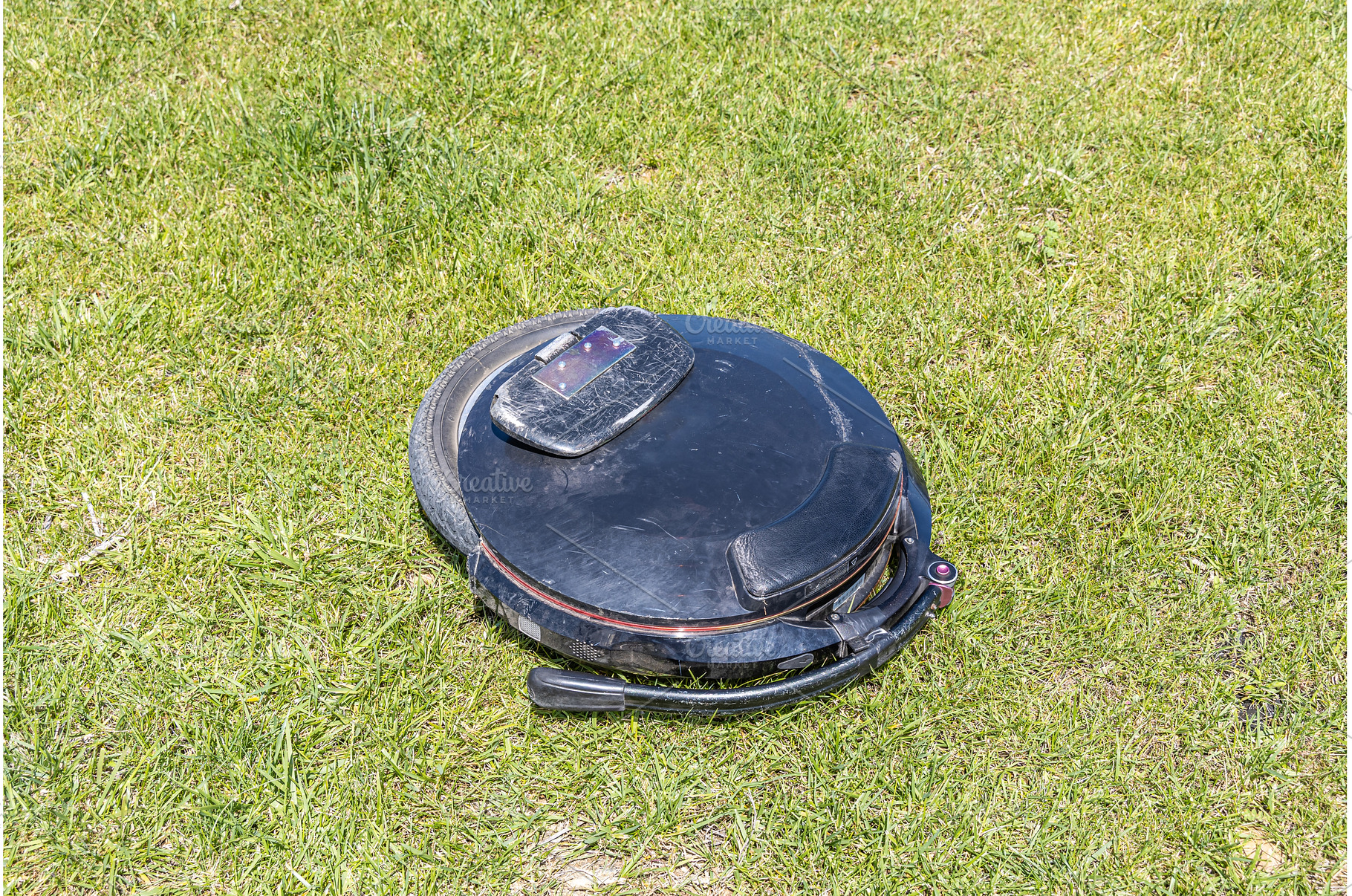 Electric unicycle leaning on the, a Technology Photo by Illustrations&photos