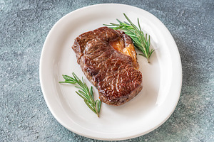 Perfectly grilled beef steak, a Food & Drink Photo by Alexander Prokopenko