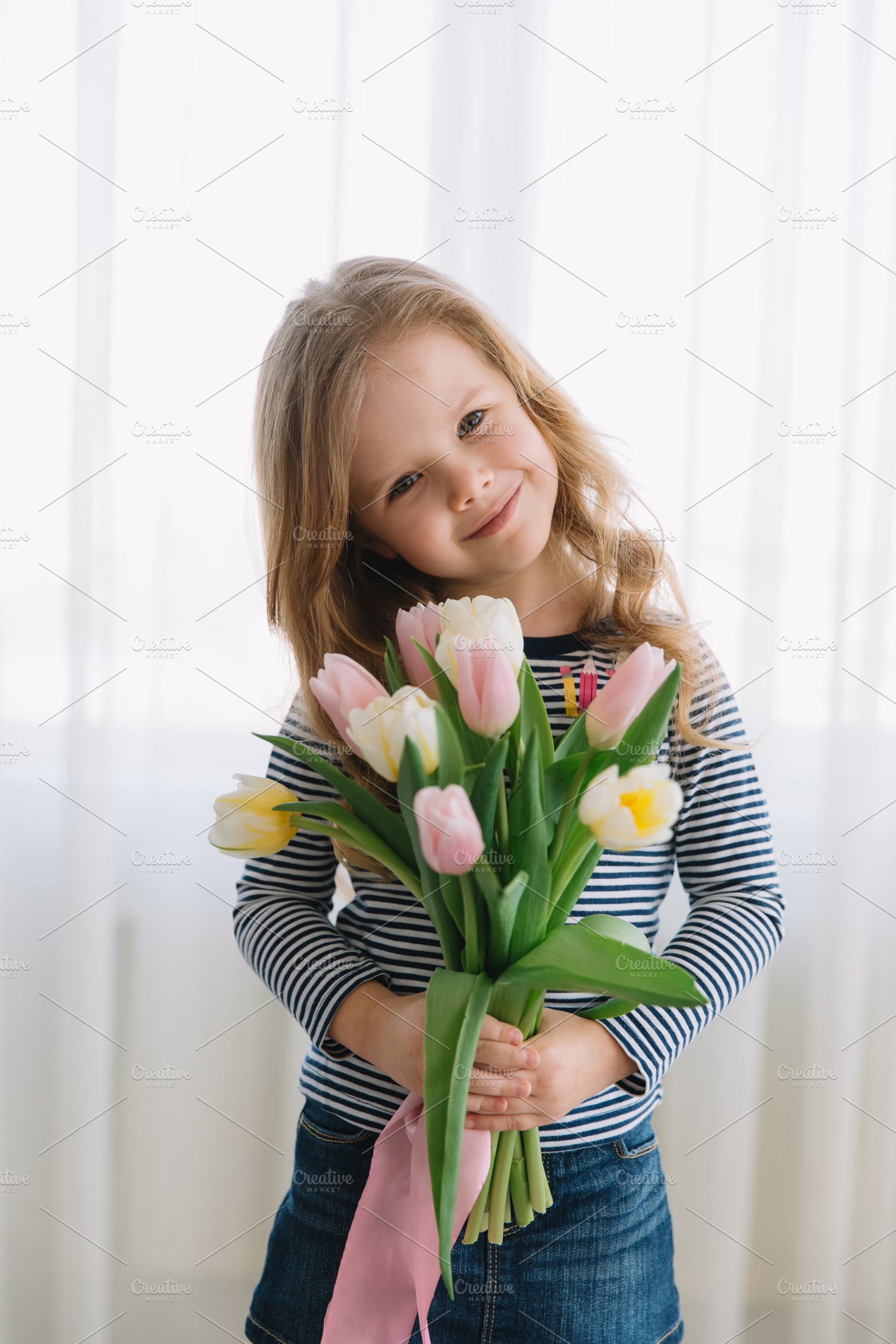 Pretty little girl with tulips stock photo containing day and mother, a Holiday Photo by Cherkas Photography