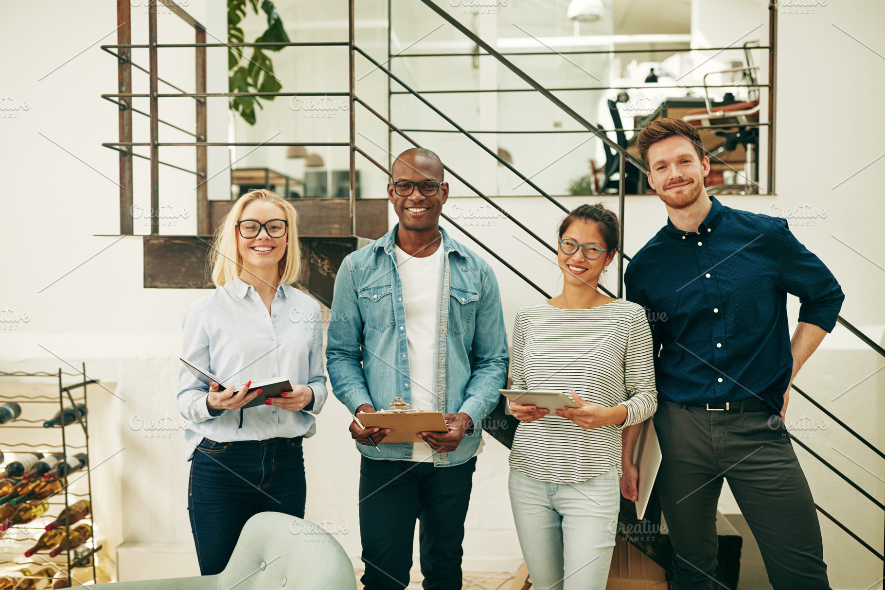 Diverse businesspeople smiling while featuring adults, advertising, and, a Business Photo by Stefan & Janni