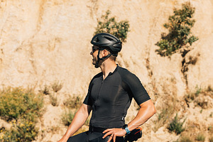 Side view of a professional cyclist, a Sports & Recreation Photo by Artem Varnitsin