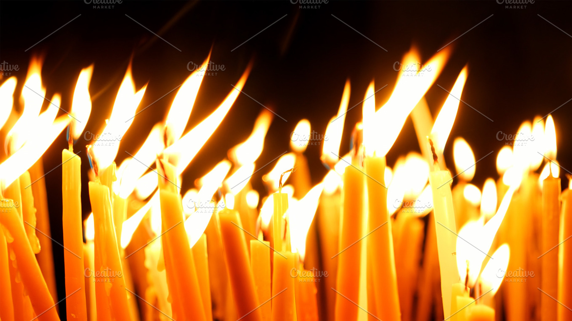 Burning candles in a Church, a Photo by HighRes Pictures