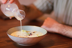 Pouring food cold soup vegetable bowl meal man, a Food & Drink Photo by Photo Drive Studio