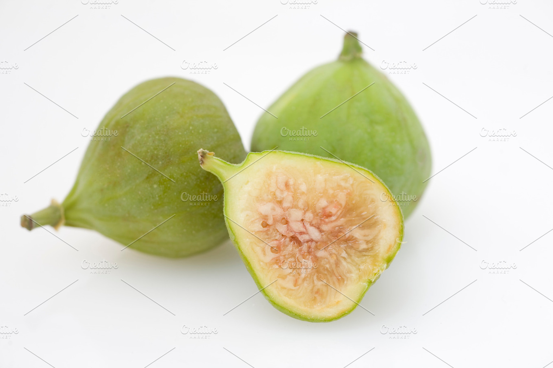 Green Figs On A White Background
