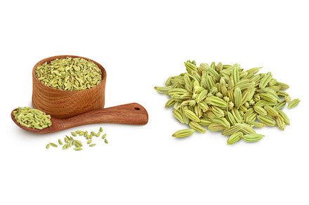 Dried fennel seeds in wooden bowl, a Food & Drink Photo by NataPhoto