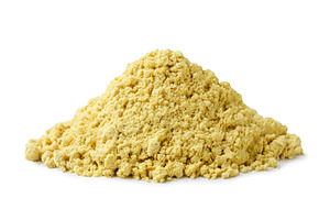 Pile of ground mustard close-up on a, a Food & Drink Photo by innakreativ