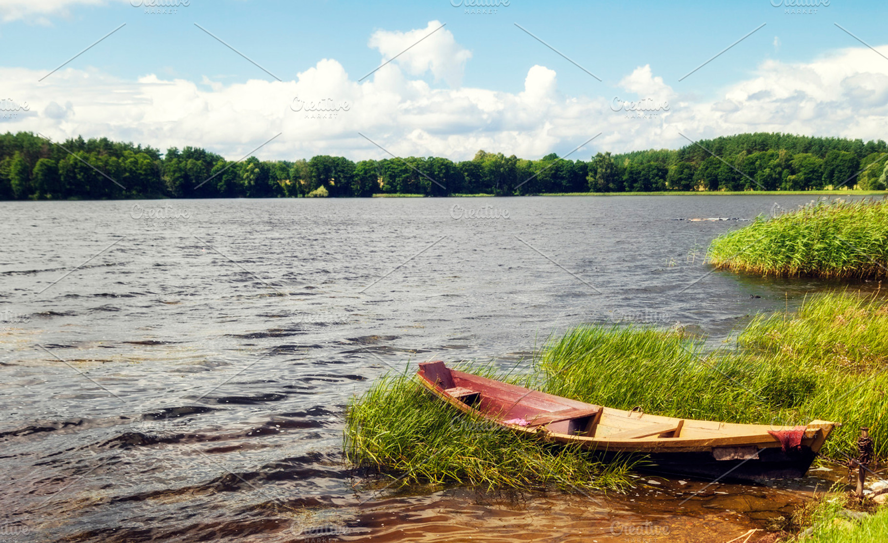 Lonely boat on the lake, a Nature Photo by BOOCYS