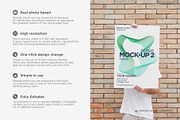 Man Holding Poster 2 Mock-up, a Print Template by Branda Keeps (Thumbnail 2 of 16)