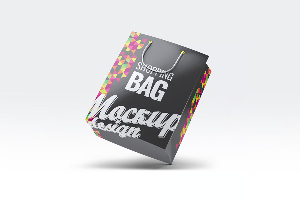 Paper Shopping Bag Mock-Up, a Packaging Mockup by DesignRushMarket (Photo 5 of 7)