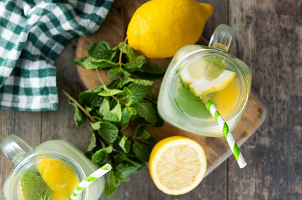 Lemonade drink in a jar glass and ingredients on wooden table, a Food & Drink Photo by etorres69