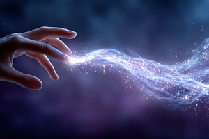 Hand Touching Magical Energy Flowing, a Photo by Pixeness Studio