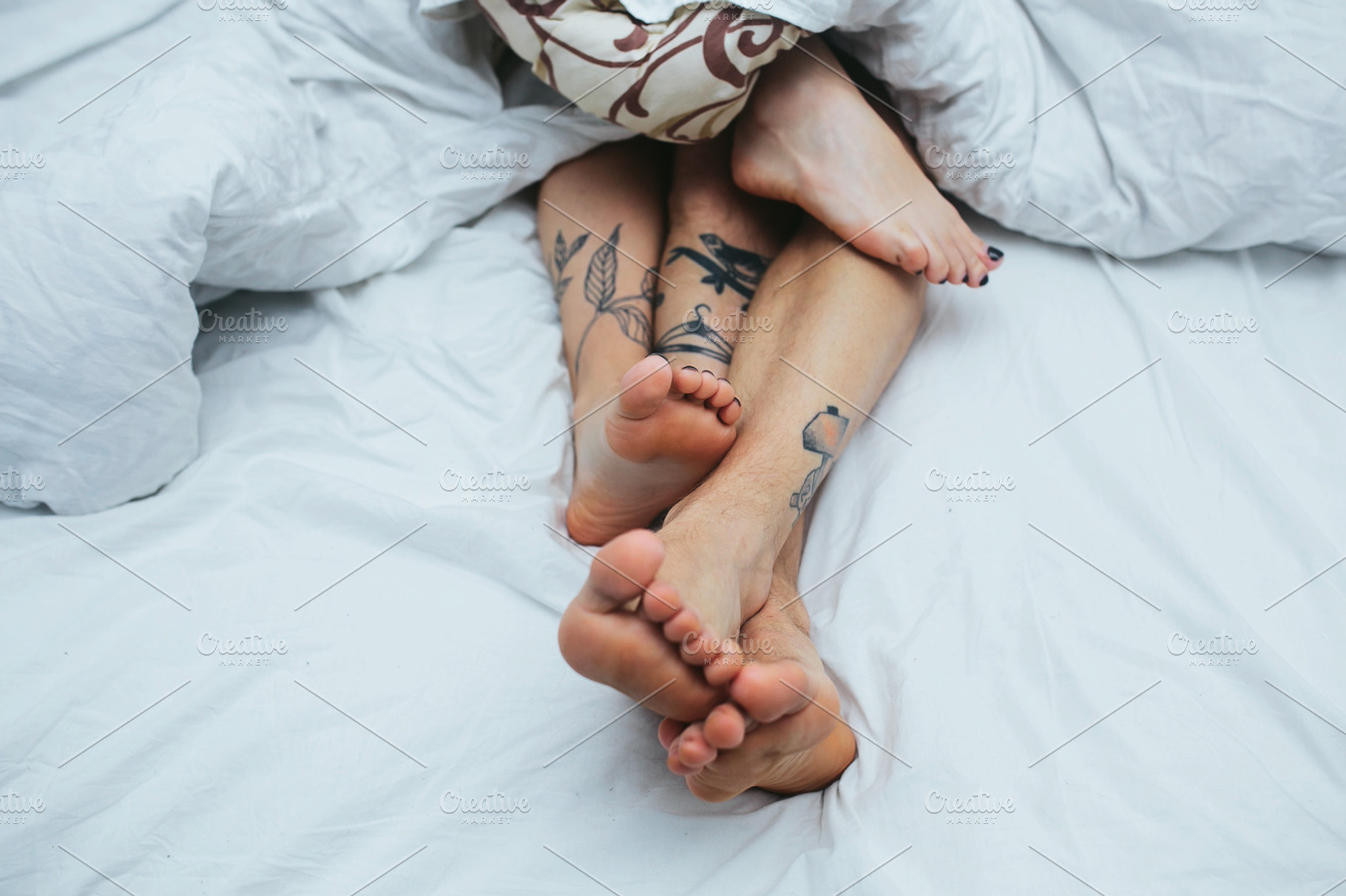 Young couple in bed together stock photo containing bed and female, a Person Photo by Tekso