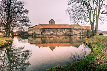 Medieval castle with water canals, a Holiday Photo by PhotoVision Pavel Rezac