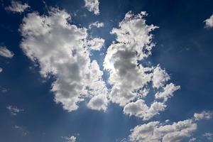 sky with clouds in sunny bright weather, natural blue sky with cumulus clouds i, a Photo by rsoollAI