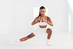 Confident fitness athlete flexing, a Sports & Recreation Photo by Artem Varnitsin