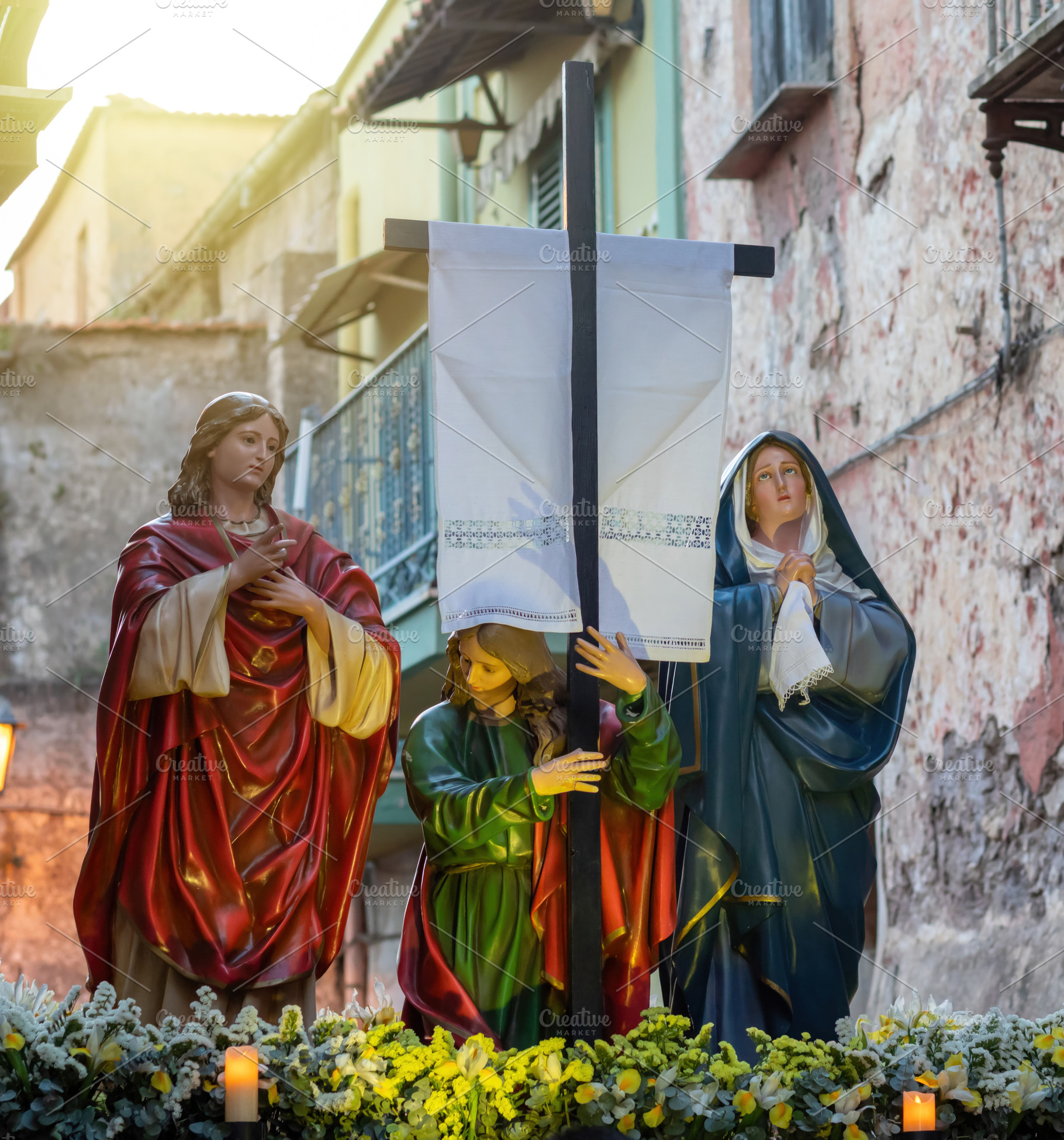 Statues of Mary, Martha and Magdalene carrying the cross during a holy week pro, a Holiday Photo by Antonio Gravante Market