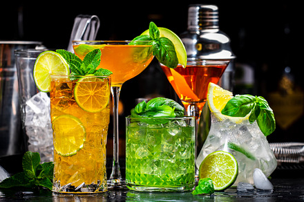 Alcoholic cocktail drinks with gin, whiskey, vermouth and liquor