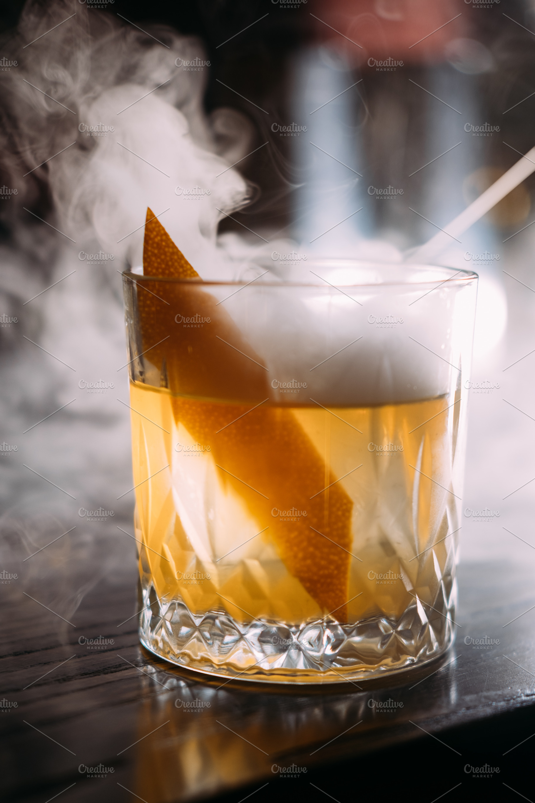 Cocktail glass sophisticated drink citrus smoke, a Food & Drink Photo by Photo Drive Studio