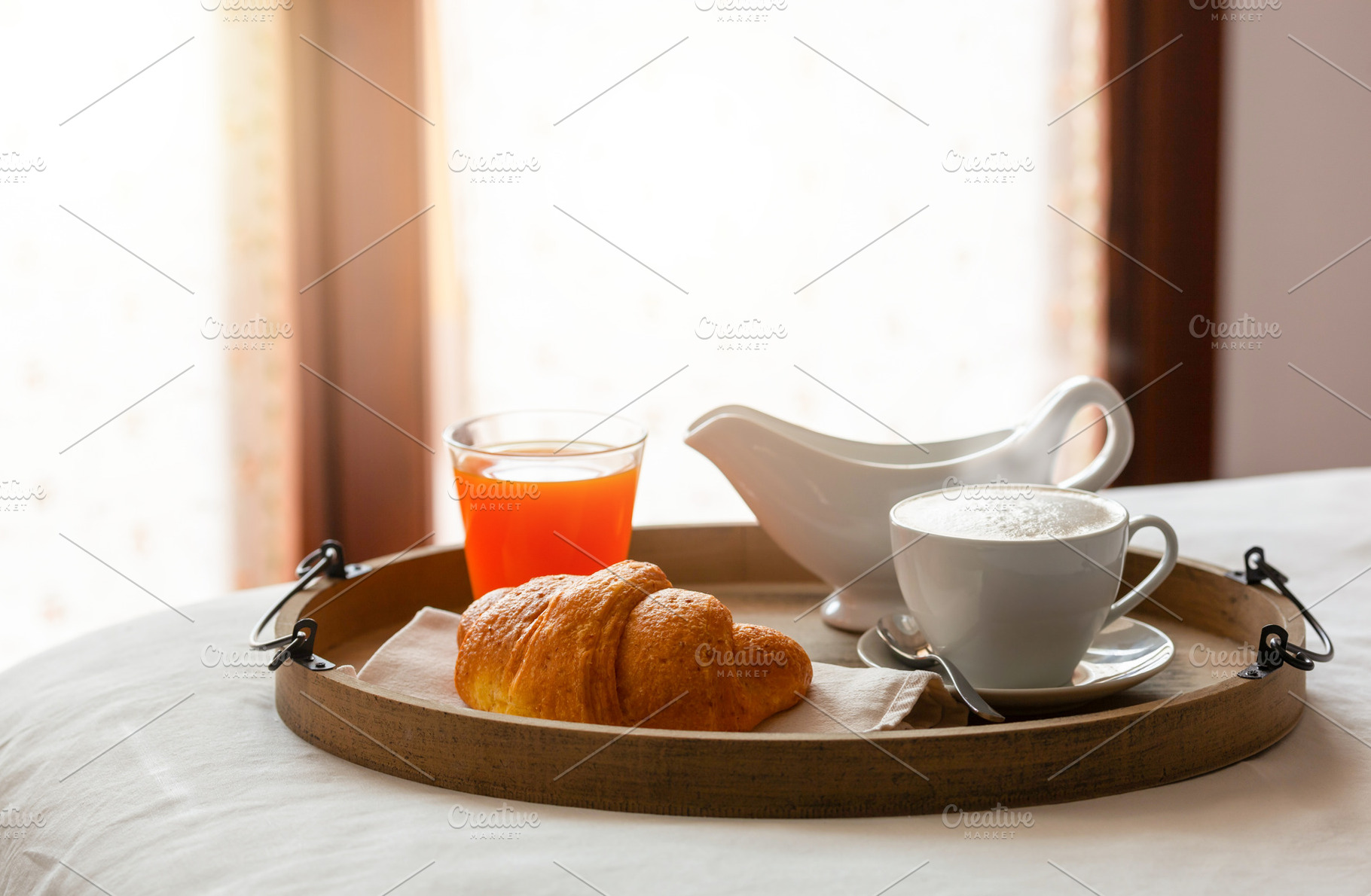 Delicious breakfast with croissant, cappuccino, orange juice and milk jug serve, a Food & Drink Photo by Antonio Gravante Market