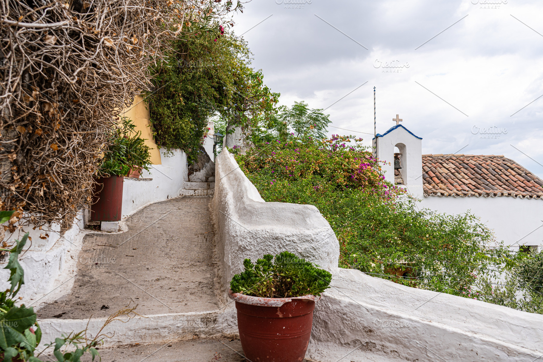 Narrow streets of Anafiotika area in ancient Athens, an Architecture Photo by Anna Bogush
