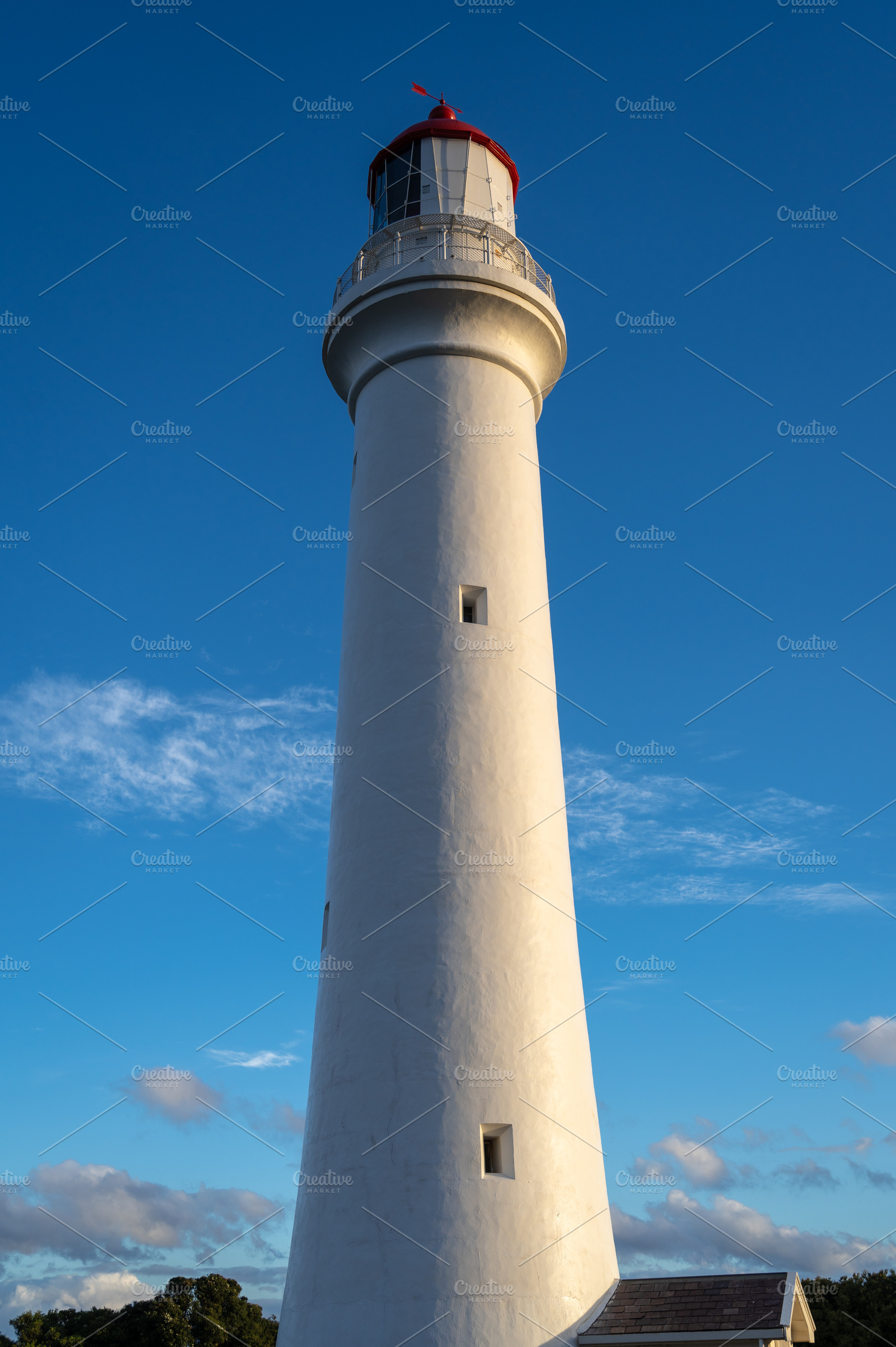 Split Point Lighthouse at sunset in Aireys Inlet, Great Ocean Ro, an Architecture Photo by GoodGoods
