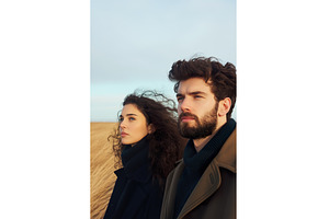 Pensive Couple on Coastal Grassland, a Nature Photo by Lermont51