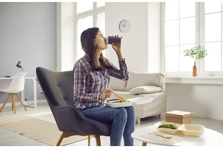 Young woman drinking coffee and, a Food & Drink Photo by StudioRomantic