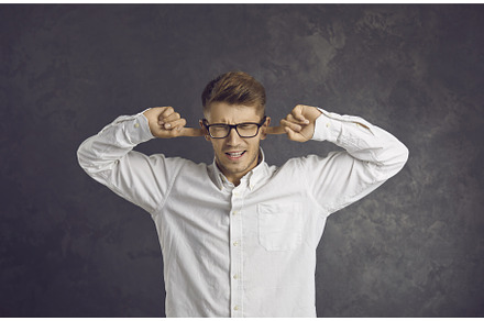 Portrait of young man trying to, a Person Photo by StudioRomantic