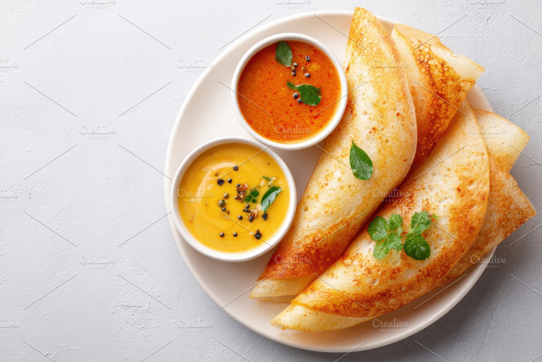 Delicious dosa with assorted chutneys, a Food & Drink Photo by AlyaAnd