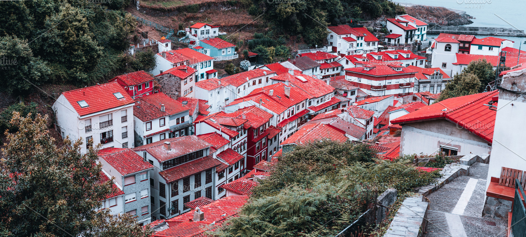 Red rooftops of Cudillero village, an Architecture Photo by SkyNext
