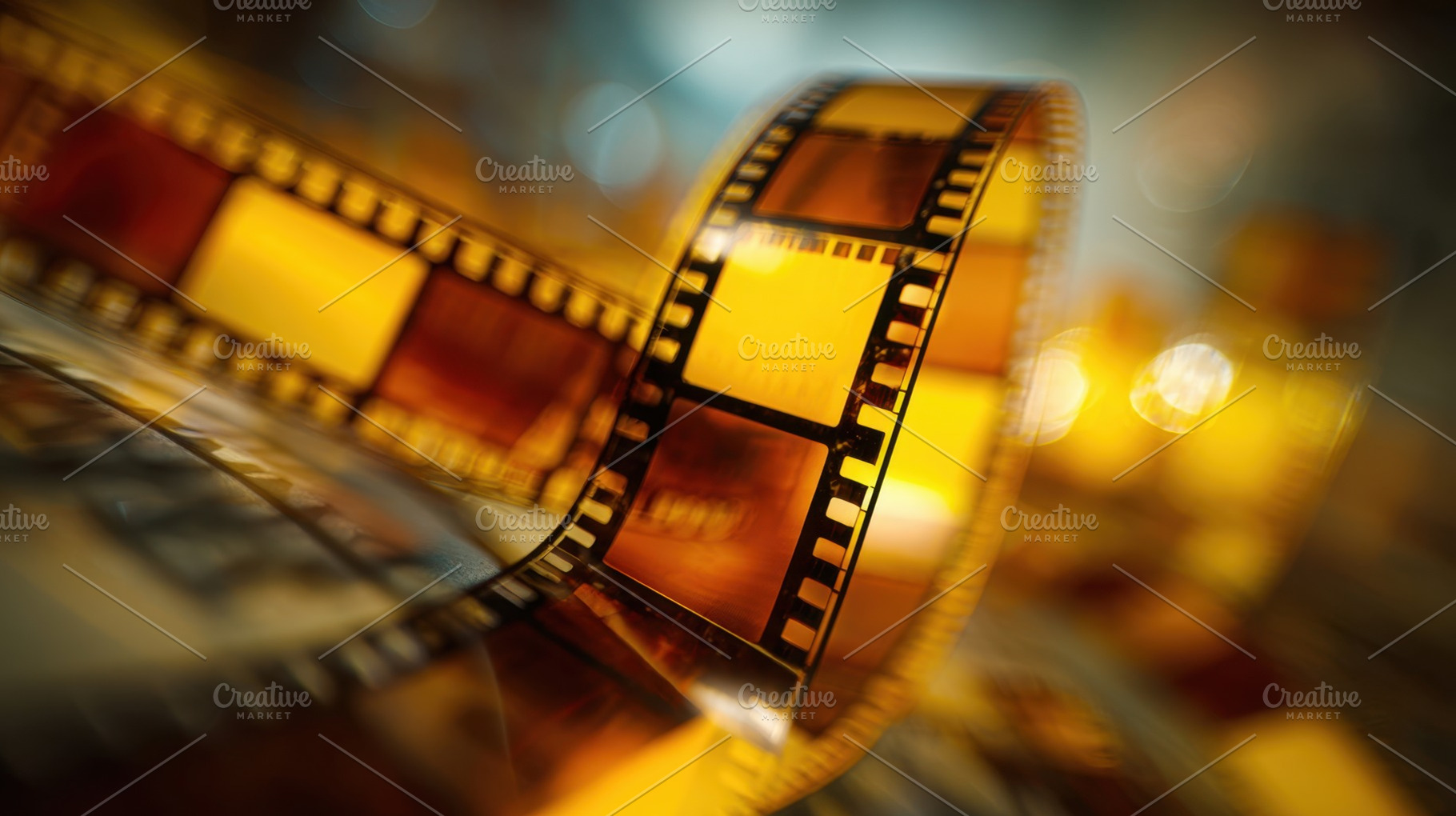 Film reel rolls across surface, a Photo by Beautiful things