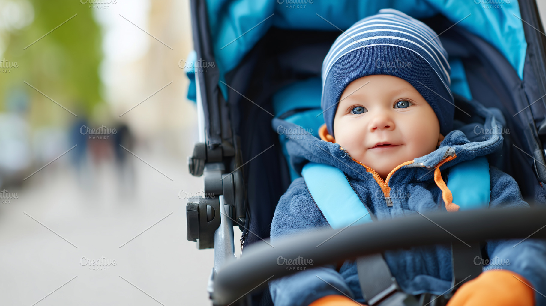 Happy baby in a blue stroller, a Person Photo by MistyDay