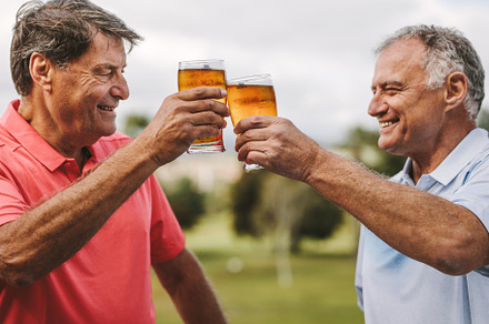 Senior men celebrating with beers, a Sports & Recreation Photo by Jacob Lund