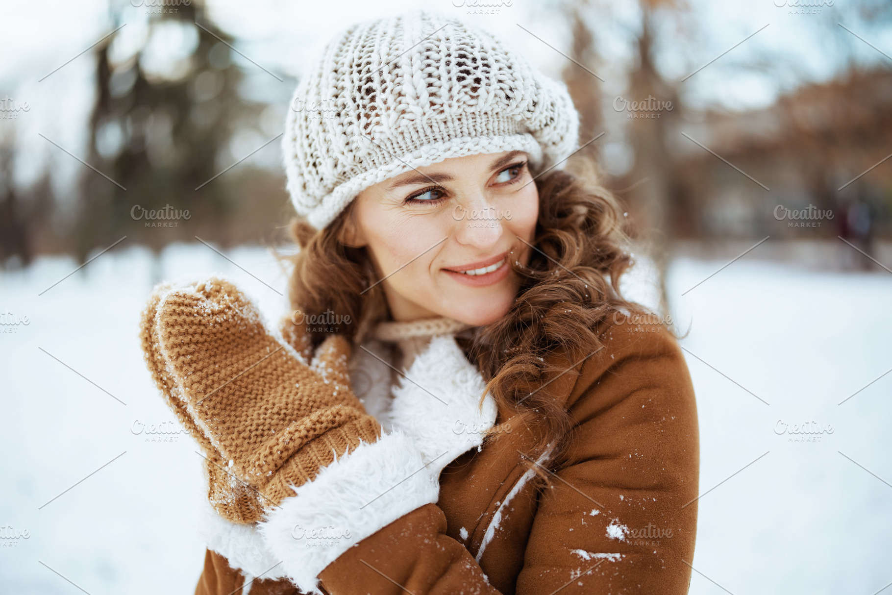 smiling stylish woman outside in city park in winter, a Person Photo by Alliance Images