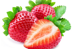 Strawberries and strawberry cross section isolated on white back, a Food & Drink Photo by Volff