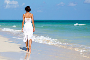 beautiful young woman on the beach, AI generated, a Photo by WorldOfPhotos