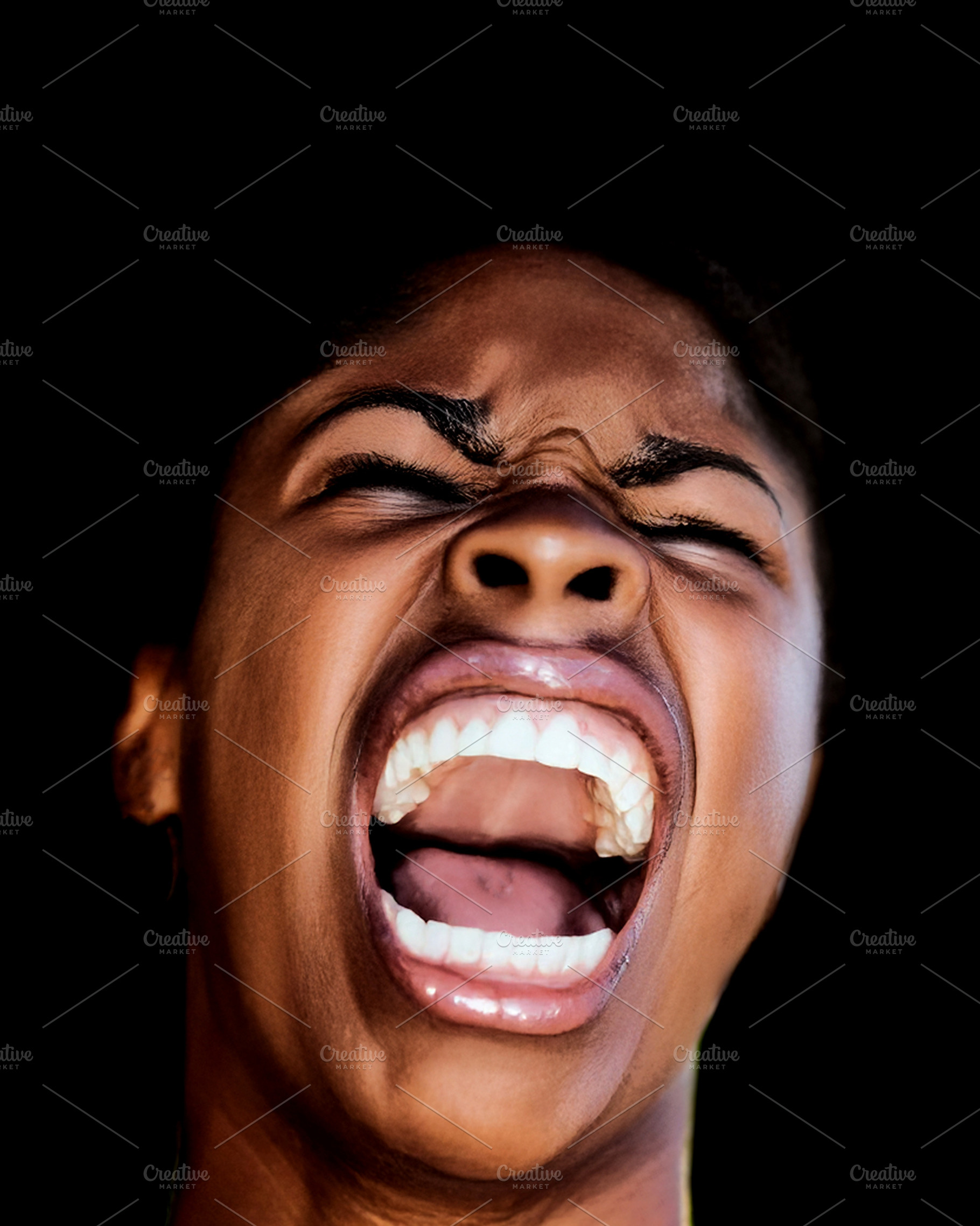 Shaved black woman with an angry expression, a Photo by DanFLCreativo