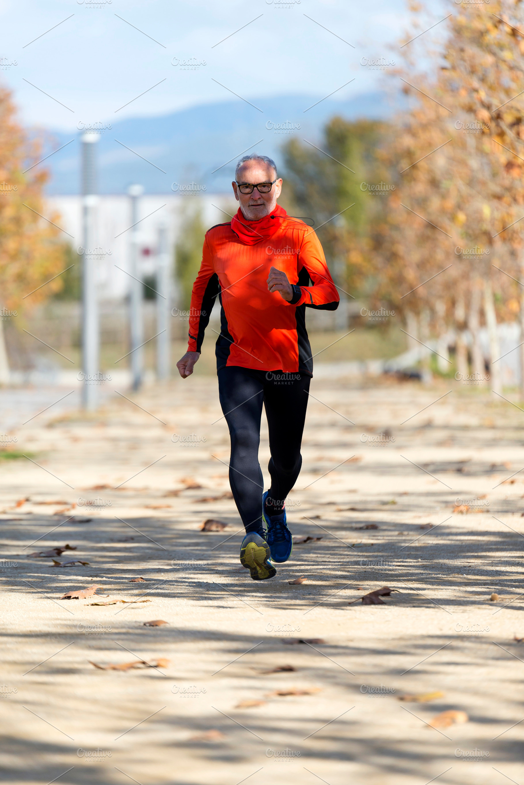 Senior man running outdoors in sportswear, a Sports & Recreation Photo by RF Images