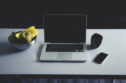 Mac laptop on a table with iphone containing mac, macbook, and laptop preview 6