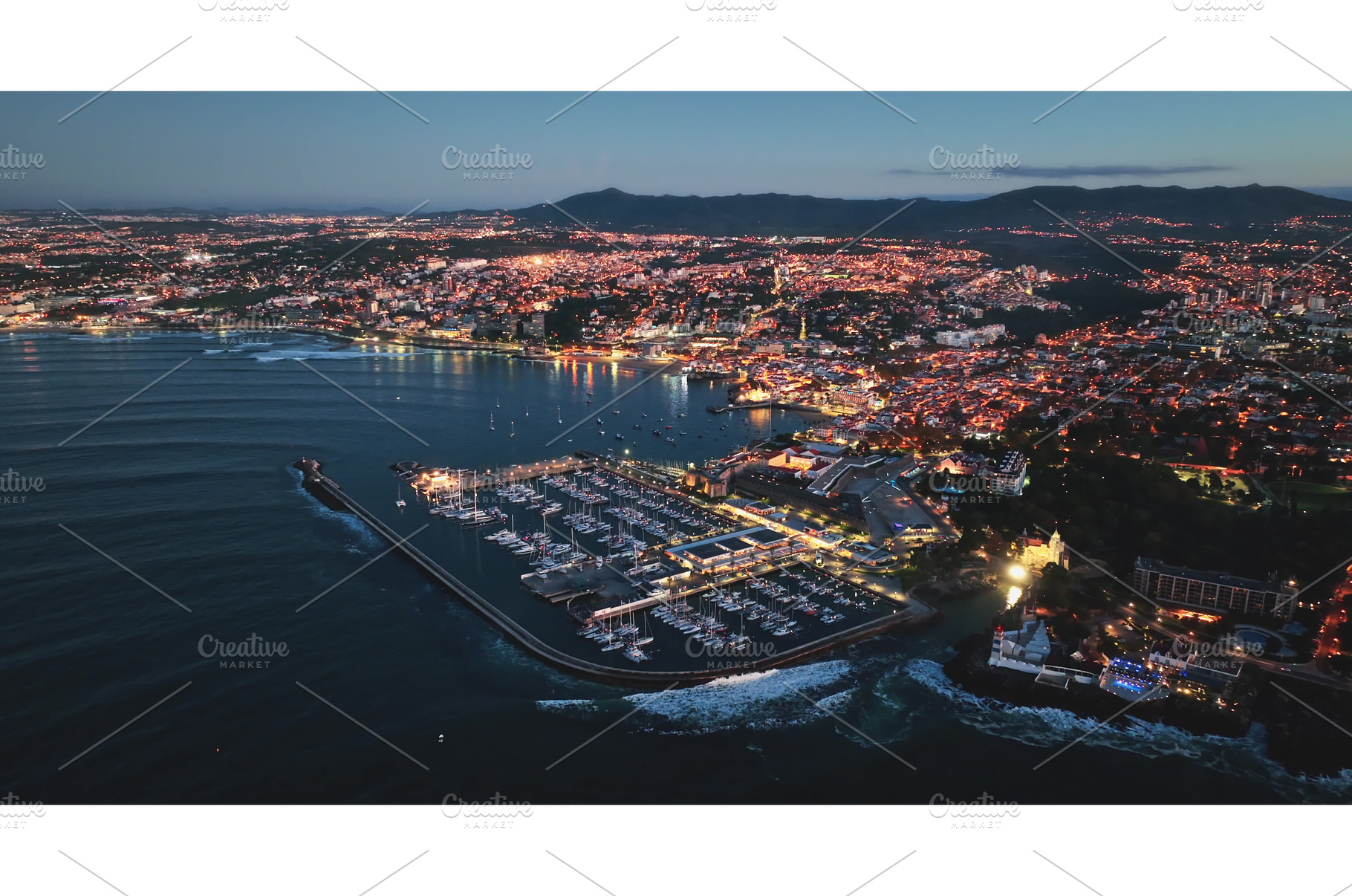 Cascais glowing at dusk, aerial view, an Architecture Photo by Goinyk