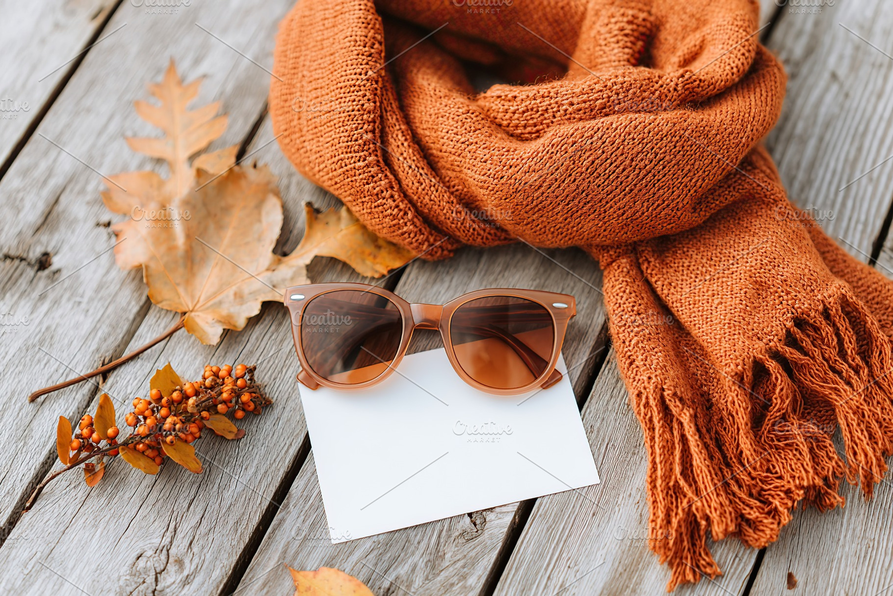 Vintage scarf and sunglasses create a warm autumn moodboard on wooden surface, a Beauty & Fashion Photo by AlyaAnd