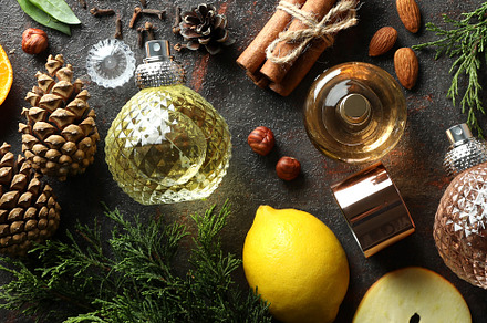 Composition with perfume bottles and different ingredients, a Beauty & Fashion Photo by AtlasStudio