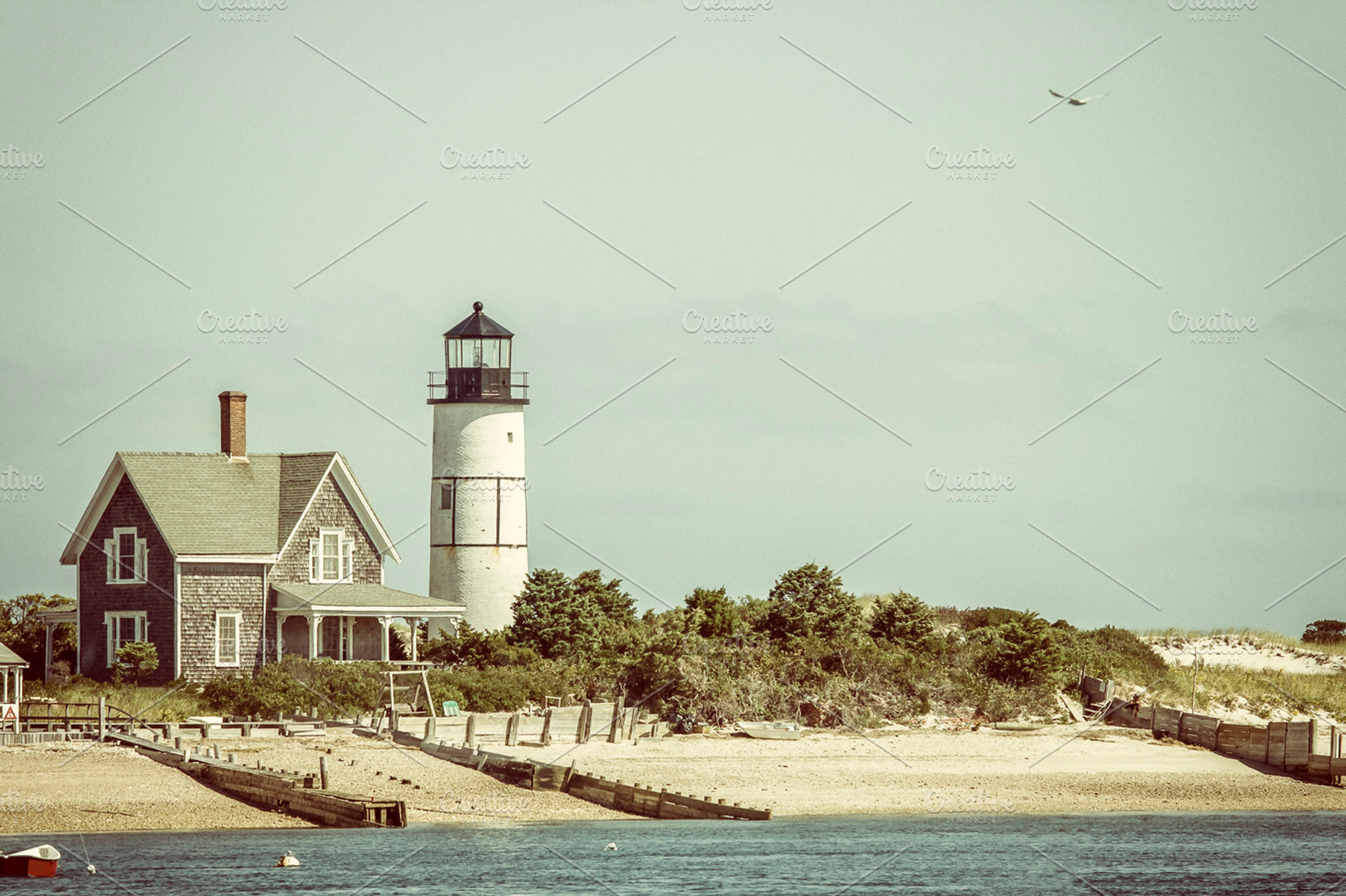 Lighthouse and home at Cape Cod