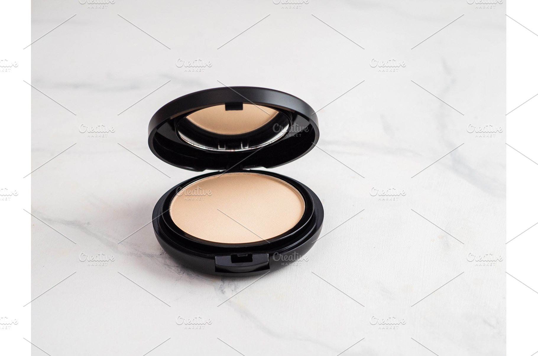 Compact powder on white marble, copy, a Beauty & Fashion Photo by Fascinadora