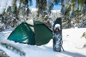 Green tent in winter forest, a Sports & Recreation Photo by Vapi
