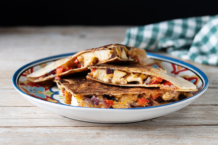 Mexican chicken quesadillas with cheese and peppers on wooden ta, a Food & Drink Photo by etorres69