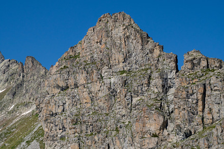 Rocky Peak with Snow-Covered Cliffs