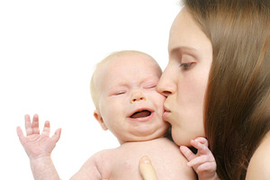 Mother kiss her baby, a Photo by saiko3p