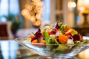 Gourmet salad with fresh vegetables and microgreens served in a, a Food & Drink Photo by Studio ANNA